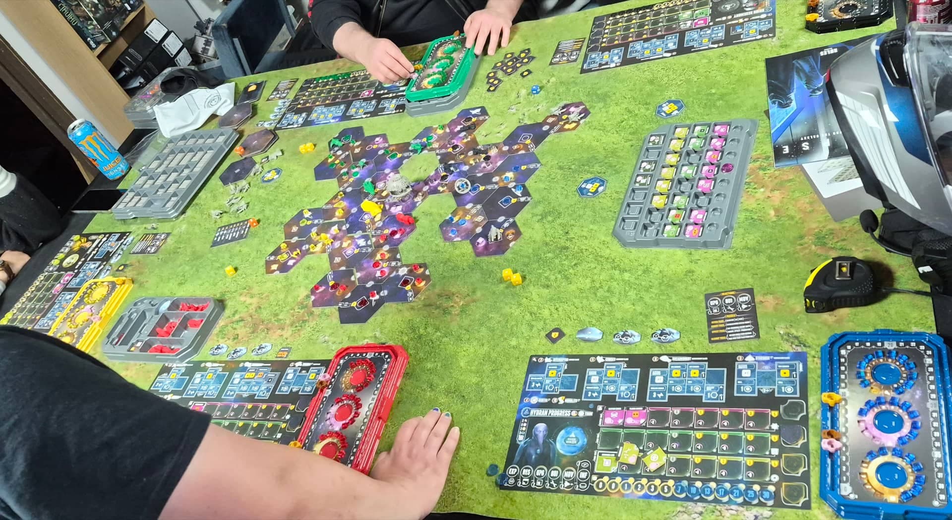 Overhead view of an Eclipse: Second Dawn for the Galaxy game in progress at a Nerdvana gaming table