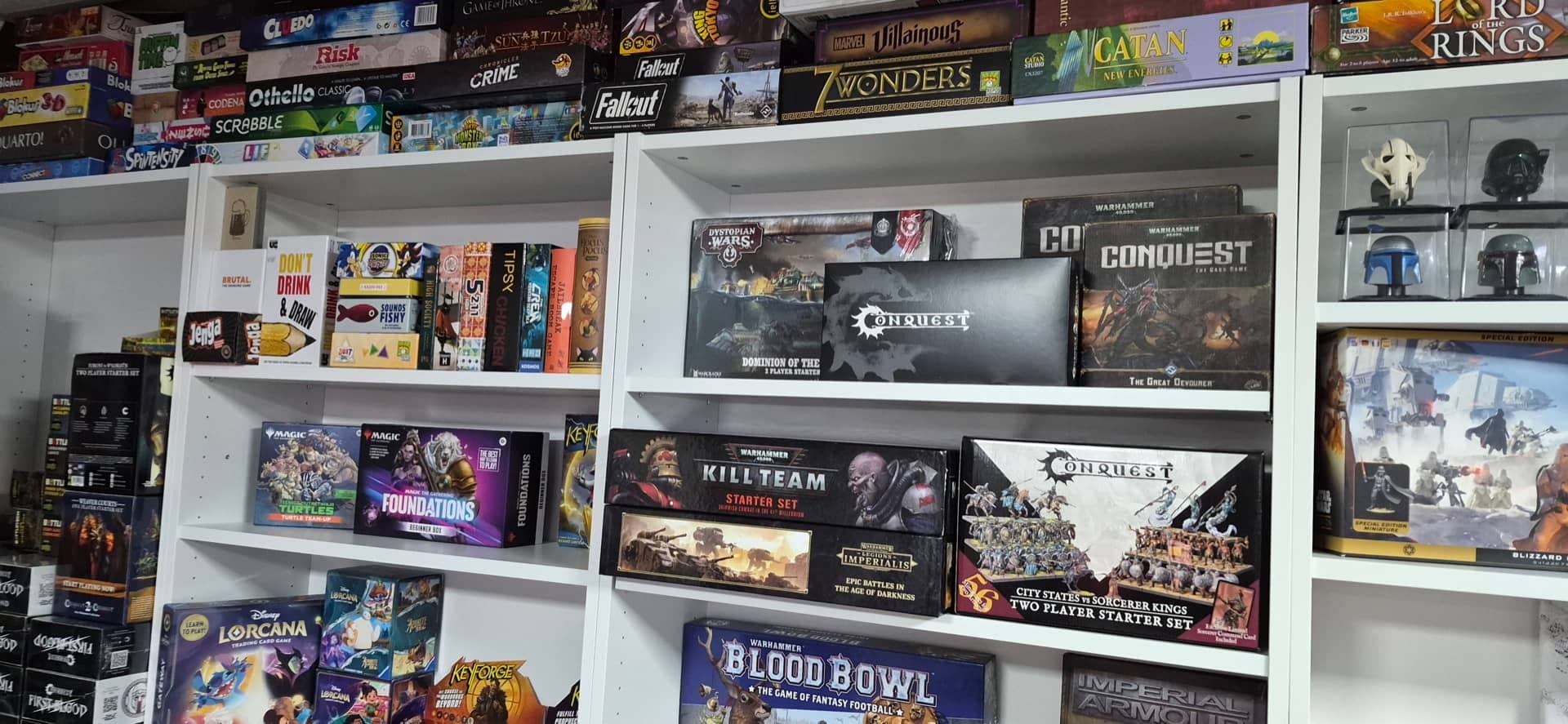 Nerdvana retail shelves stocked with board games and miniatures